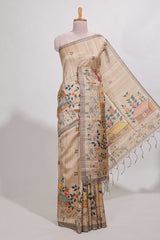 Beige colour artistic village art tussar saree with small border and matching pallu