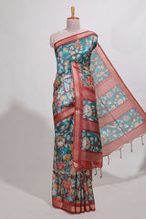 Turkish blue kalamkari style tussar saree with small zari border and print pallu with floral print blouse