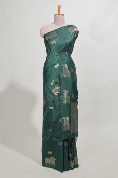 green tussar saree elephant inspired zari motifs  with  zari butta blouse and matching pallu