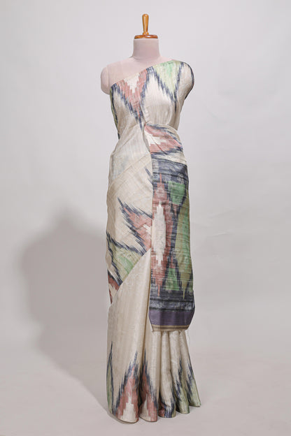 Off white ikkat print tussar saree pastel multi coloured ikkat patterns with matching blouse with matching pallu
