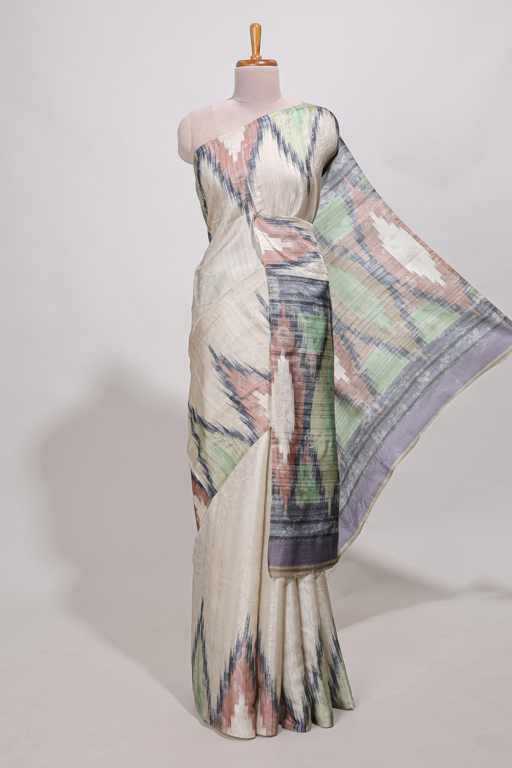 Off white ikkat print tussar saree pastel multi coloured ikkat patterns with matching blouse with matching pallu