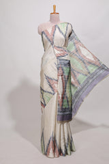 Off white ikkat print tussar saree pastel multi coloured ikkat patterns with matching blouse with matching pallu