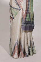 Off white ikkat print tussar saree pastel multi coloured ikkat patterns with matching blouse with matching pallu