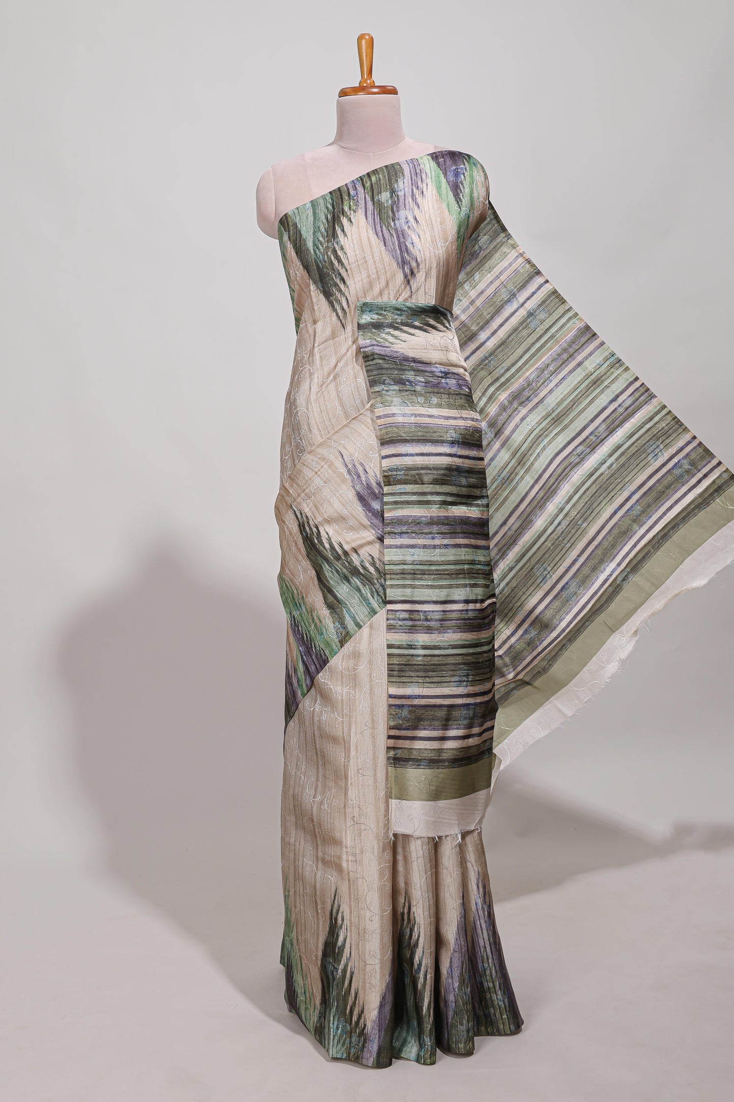 Green ikkat print tussar saree pastel multi coloured ikkat patterns with matching blouse with matching pallu