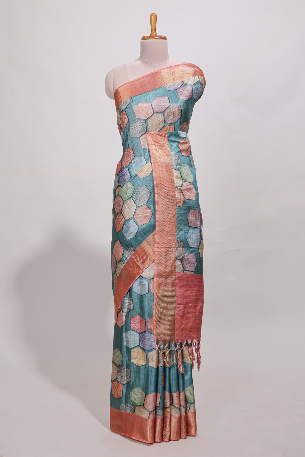 Sea green geometrical tussar silk saree multi coloured honeycomb geomatric  patterns ,  rich matching pallu along with tussles