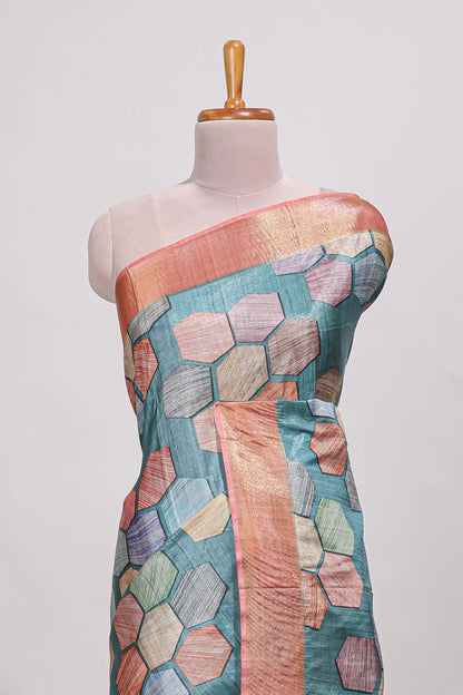 Sea green geometrical tussar silk saree multi coloured honeycomb geomatric  patterns ,  rich matching pallu along with tussles