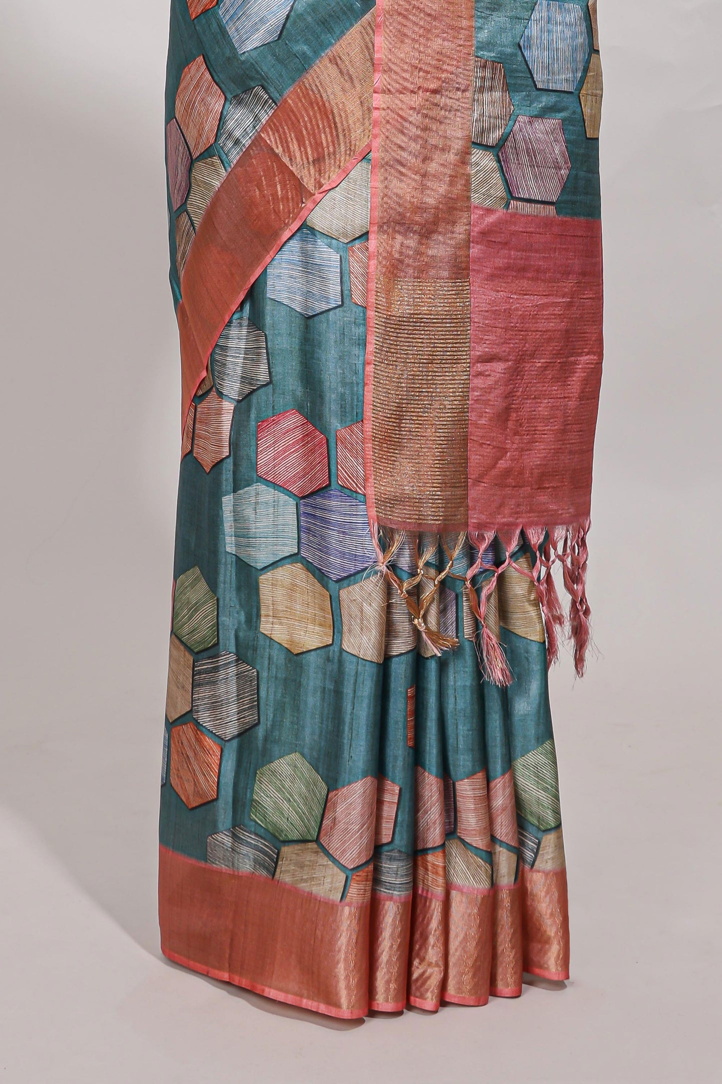 Sea green geometrical tussar silk saree multi coloured honeycomb geomatric  patterns ,  rich matching pallu along with tussles