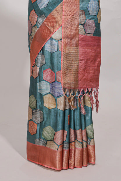 Sea green geometrical tussar silk saree multi coloured honeycomb geomatric  patterns ,  rich matching pallu along with tussles