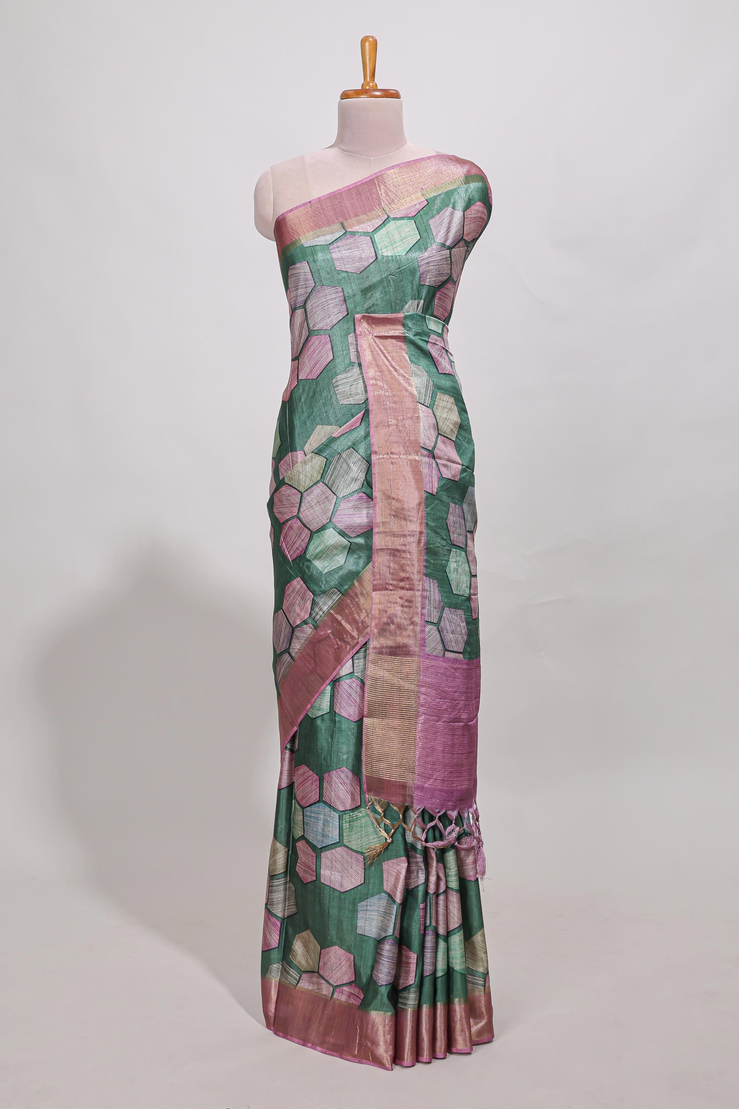 Green geometrical tussar silk saree multi coloured honeycomb geomatric  patterns ,  rich matching pallu along with tussles