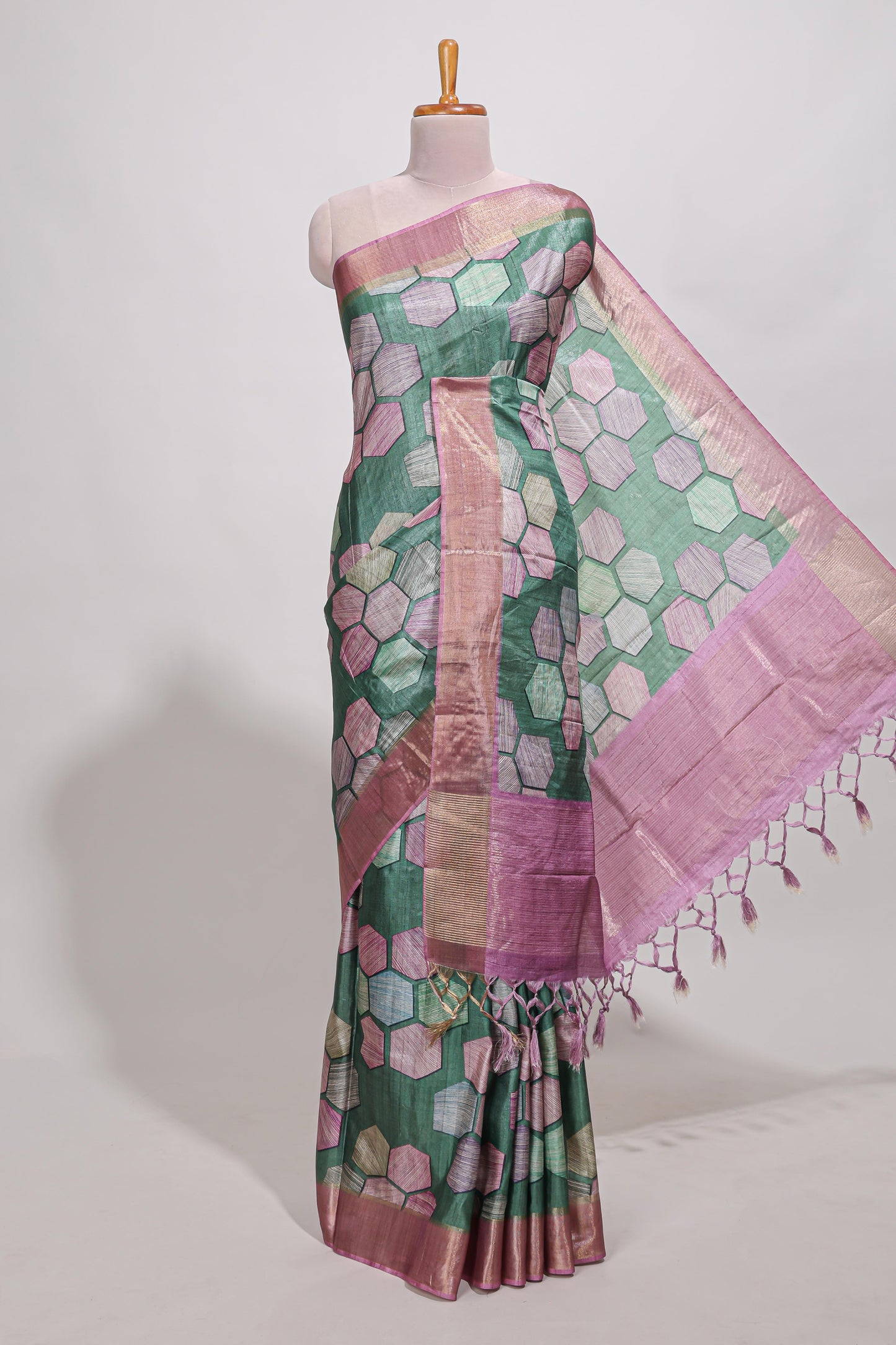 Green geometrical tussar silk saree multi coloured honeycomb geomatric  patterns ,  rich matching pallu along with tussles