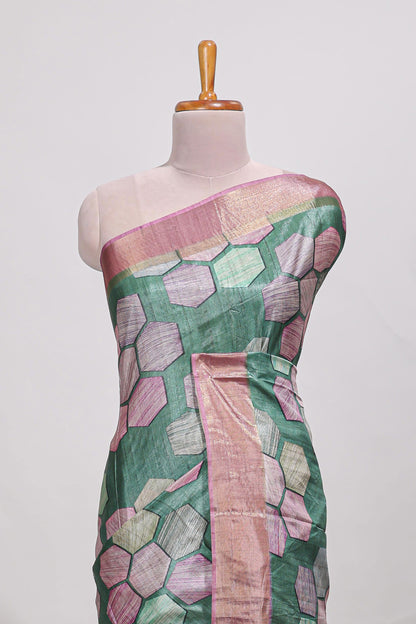 Green geometrical tussar silk saree multi coloured honeycomb geomatric  patterns ,  rich matching pallu along with tussles
