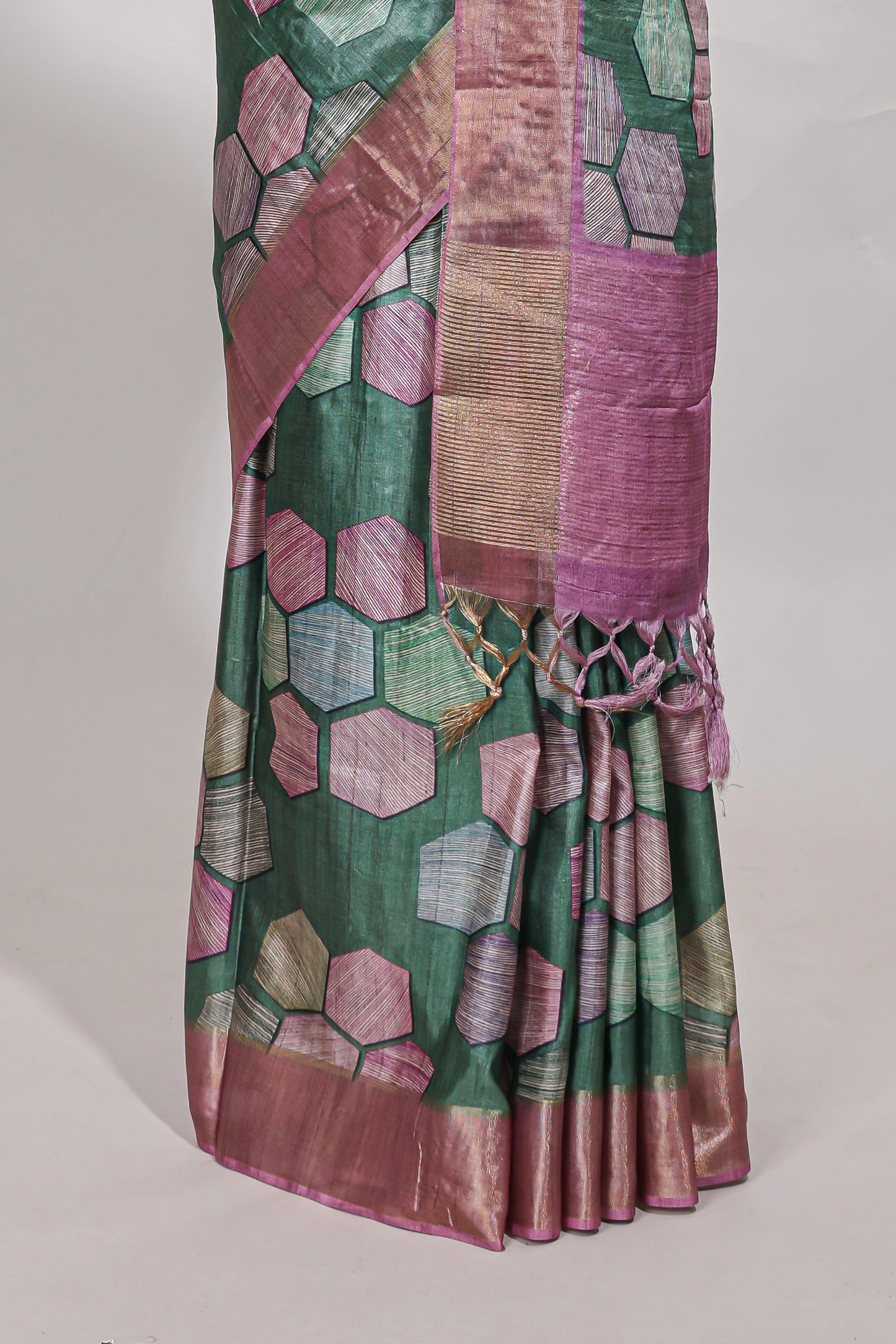 Green geometrical tussar silk saree multi coloured honeycomb geomatric  patterns ,  rich matching pallu along with tussles