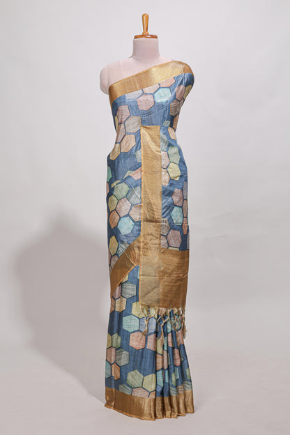 Blue geometrical tussar silk saree multi coloured honeycomb geomatric  patterns ,  rich matching pallu along with tassles