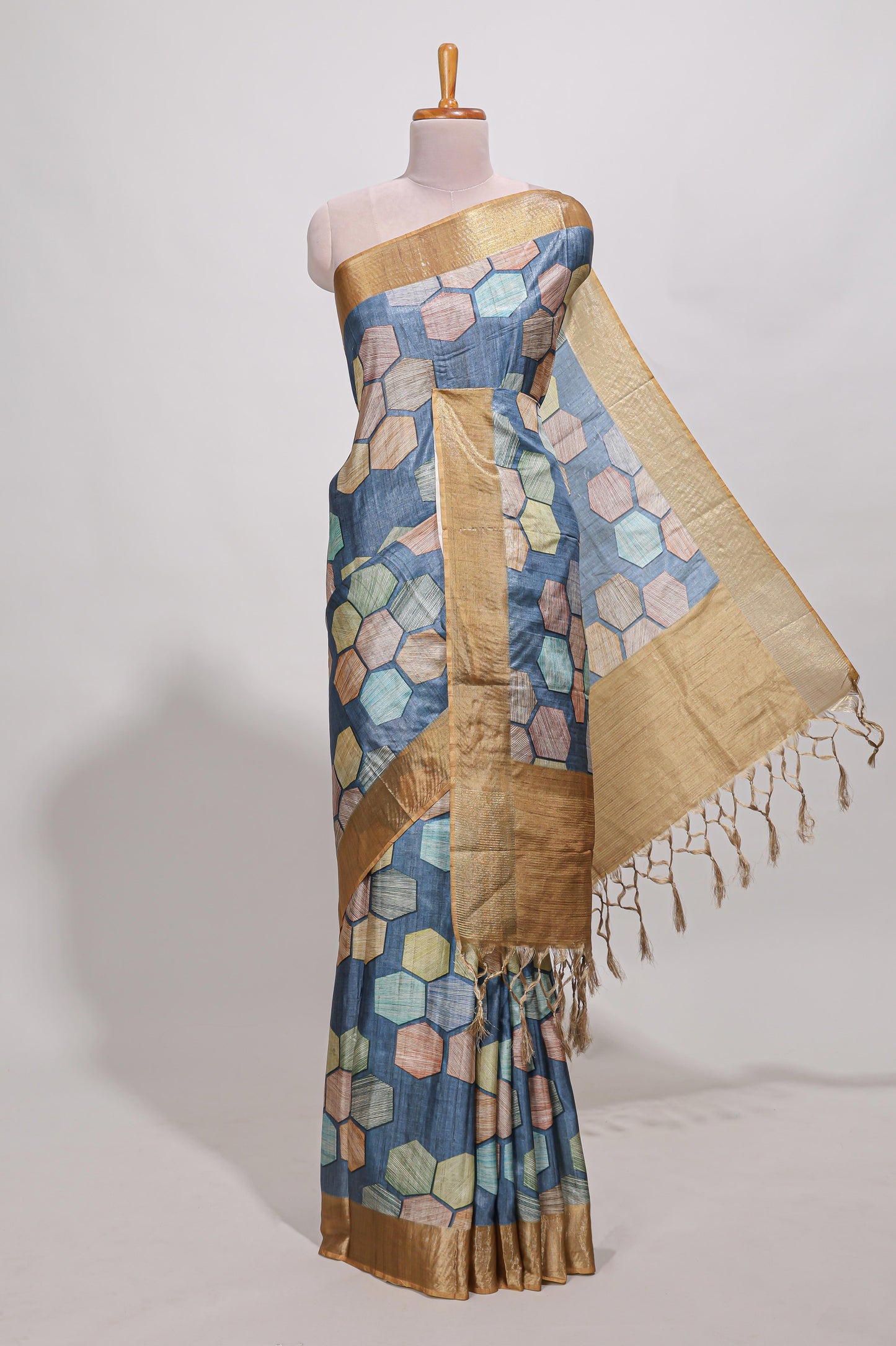 Blue geometrical tussar silk saree multi coloured honeycomb geomatric  patterns ,  rich matching pallu along with tassles