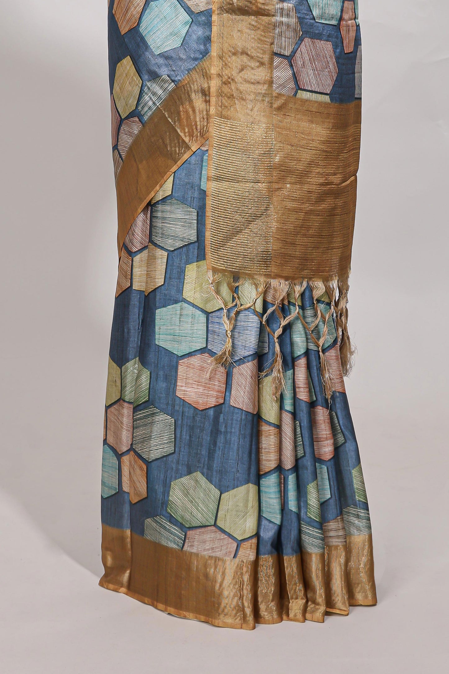Blue geometrical tussar silk saree multi coloured honeycomb geomatric  patterns ,  rich matching pallu along with tassles