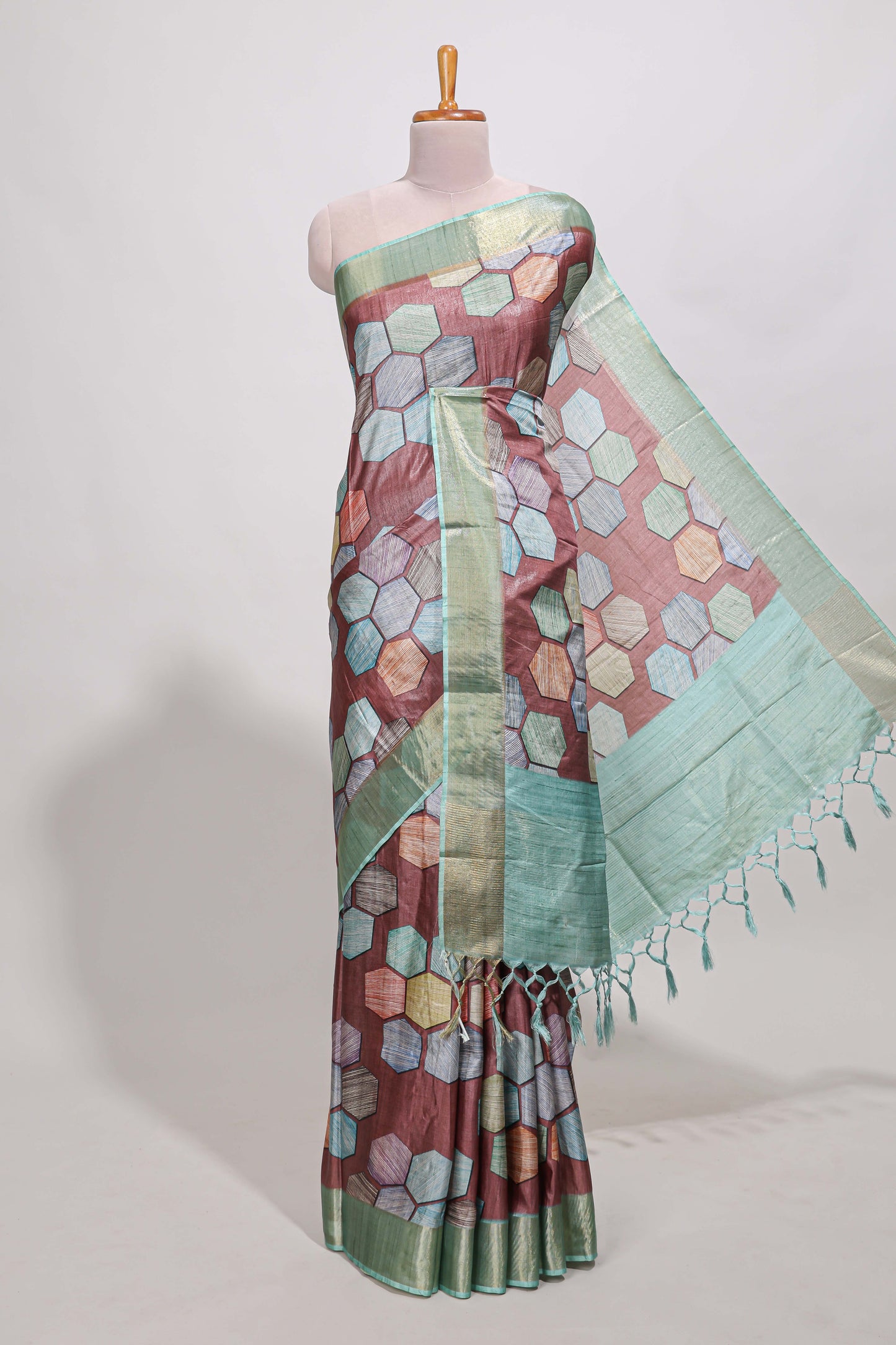 Brick red geometrical tussar silk saree multi coloured honeycomb geomatric  patterns ,  rich matching pallu along with tassles