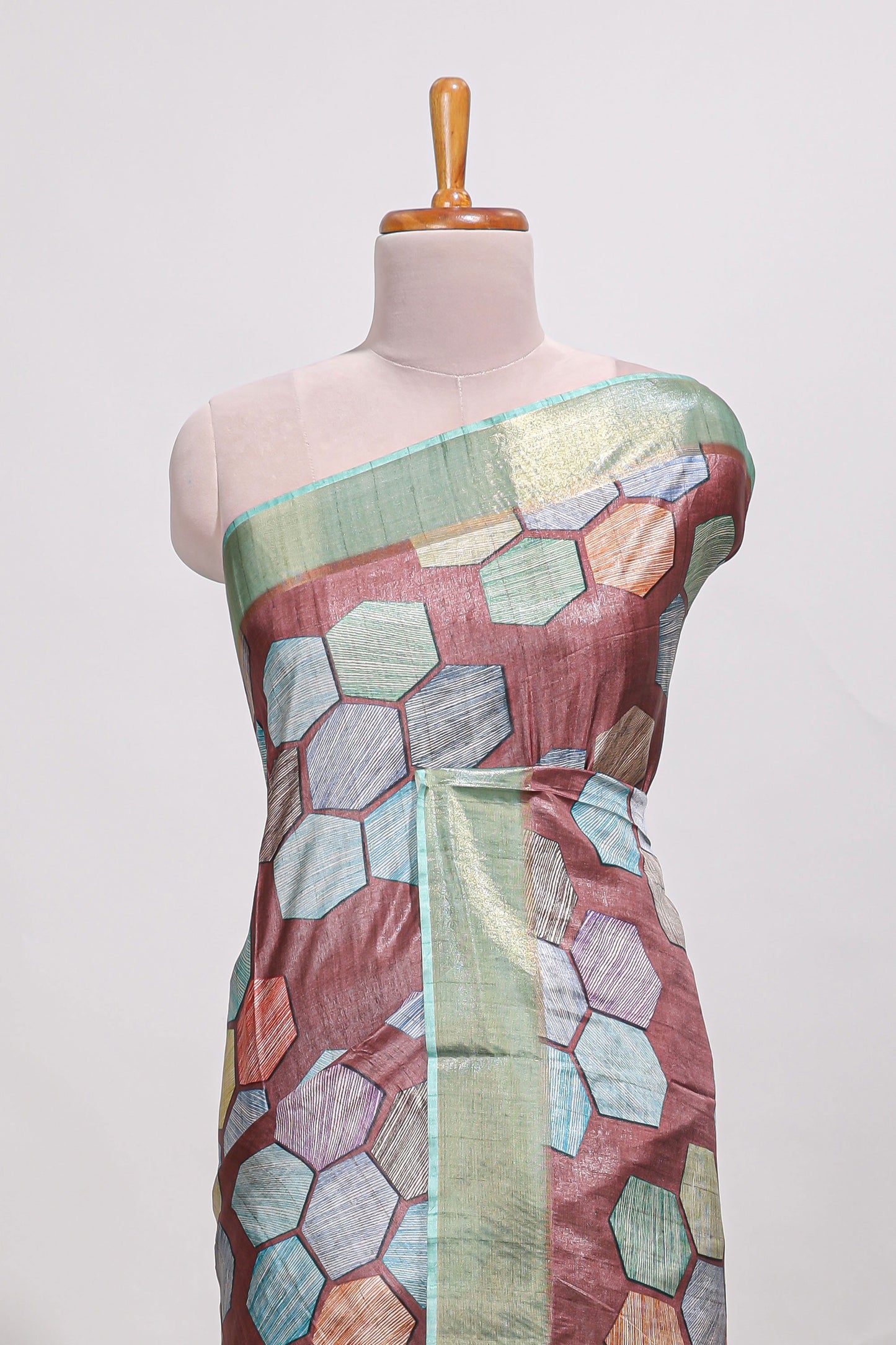 Brick red geometrical tussar silk saree multi coloured honeycomb geomatric  patterns ,  rich matching pallu along with tassles
