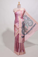 Onion pink kalamakri tussar saree body with floral creeper prints zari border and kalamkari peacock motif print pallu