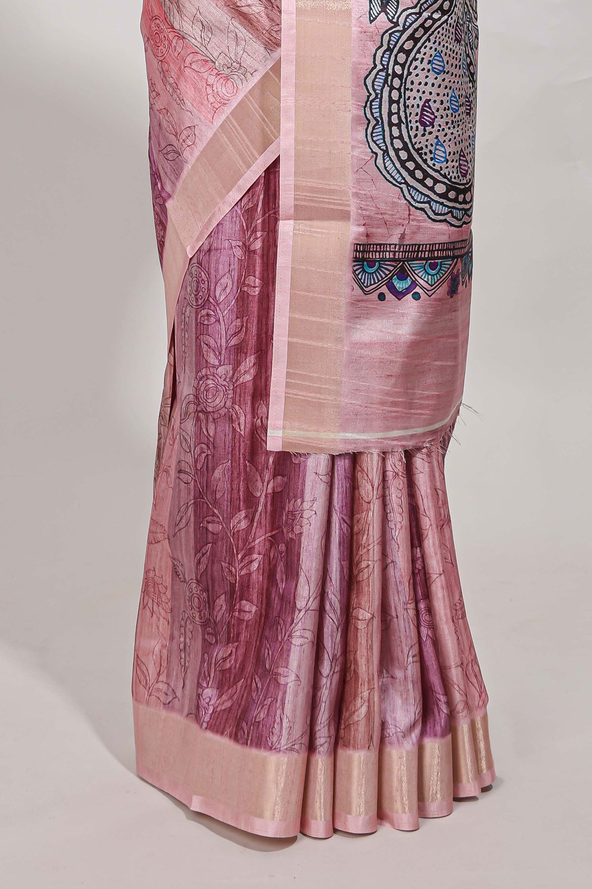 Onion pink kalamakri tussar saree body with floral creeper prints zari border and kalamkari peacock motif print pallu