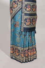 Blue patolatussar saree pichwai art and peacock motifs elephant designs with rich matching pallu along with tussels