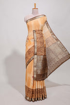 Orange geomatric tussar saree contrasting brown border with geomatric patterns ,and matching pallu with zari stripes blouse