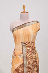 Orange geomatric tussar saree contrasting brown border with geomatric patterns ,and matching pallu with zari stripes blouse