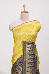 Yellow semi tussar sareeall-over fine checked zari with border geometric zig-zag metallic weaving and contrast blouse