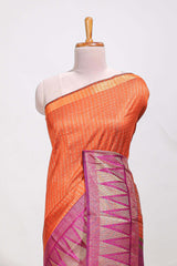 Orange semi tussar sareeall-over fine checked zari with border geometric zig-zag metallic weaving and contrast blouse