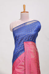 Rich royal blue silk body golden zari butta pattern and Broad golden zari border with contrast blouse