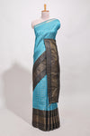 Blue silk body golden zari butta pattern and Broad golden zari border with contrast blouse