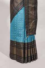 Blue silk body golden zari butta pattern and Broad golden zari border with contrast blouse
