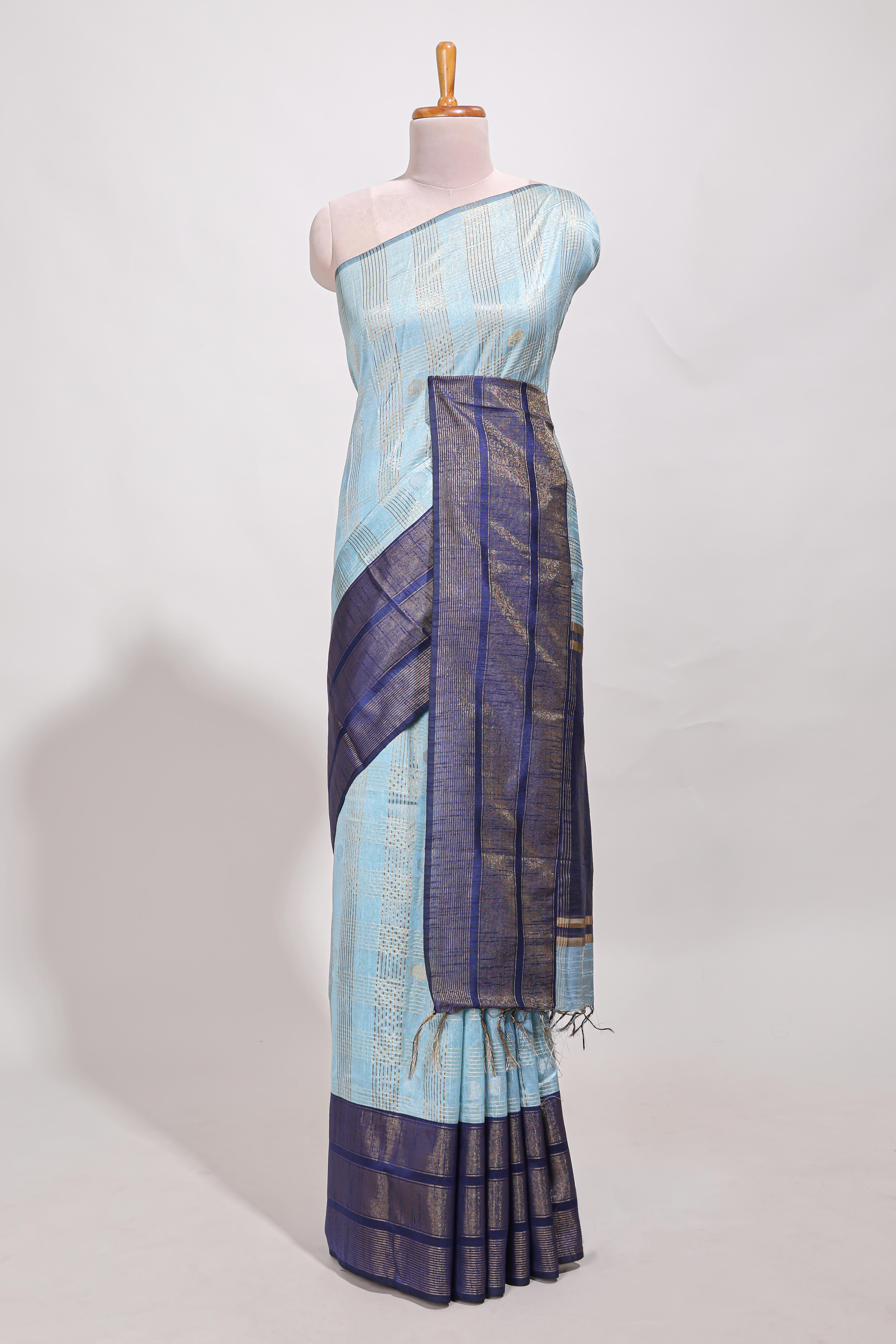 Powder blue silk body golden zari striped pattern and Broad golden zari border with contrast blouse