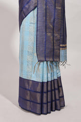 Powder blue silk body golden zari striped pattern and Broad golden zari border with contrast blouse