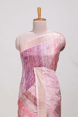 Onion pink kalamakri tussar saree body with floral creeper prints zari border and kalamkari peacock motif print pallu