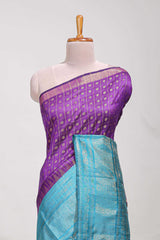 Violet semi tussar saree all over zari checks and buttas with contrast border and contrast blouse