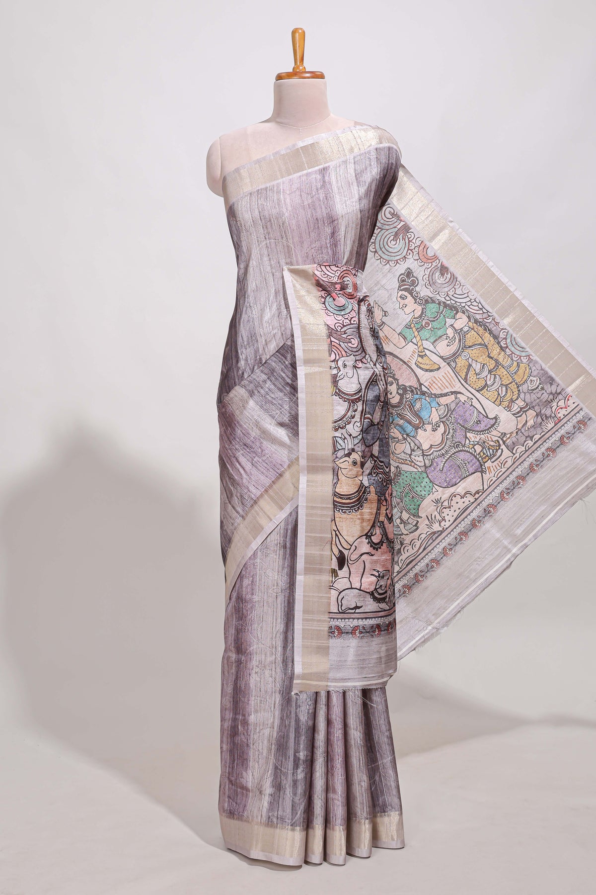 kalamakri art  tussar saree  with floral creeper prints zari border and kalamkari peacock motif print pallu