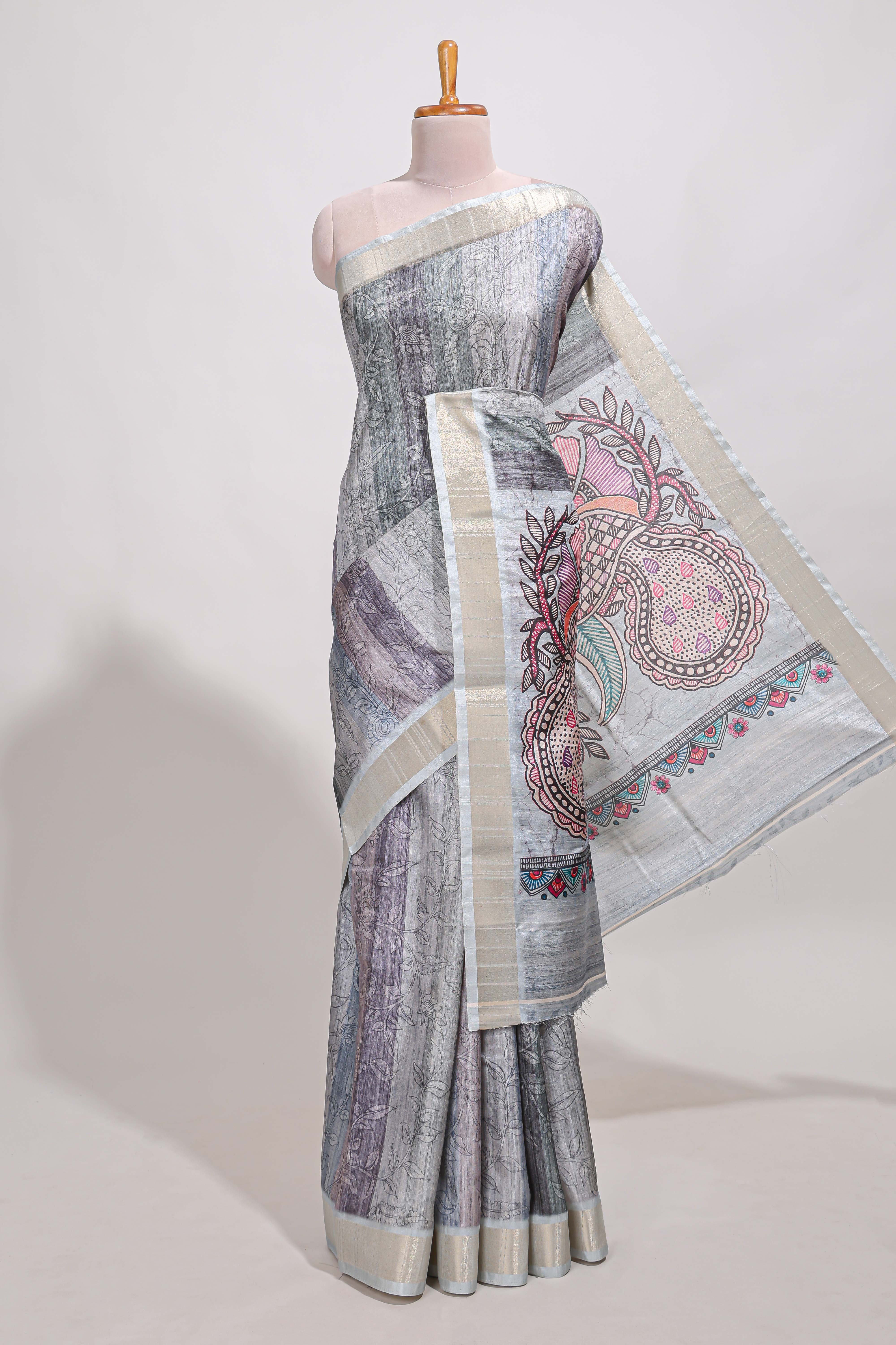 Green kalamakri arttussar sareewith floral creeper prints zari border and kalamkari peacock motif print pallu