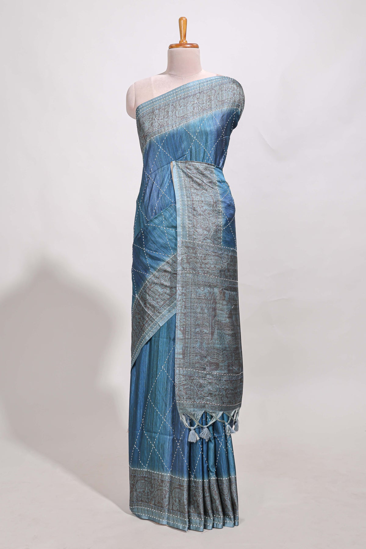 Ocean blue semi tussar saree all over thread work and intricate floral border and pallu with contrast blouse