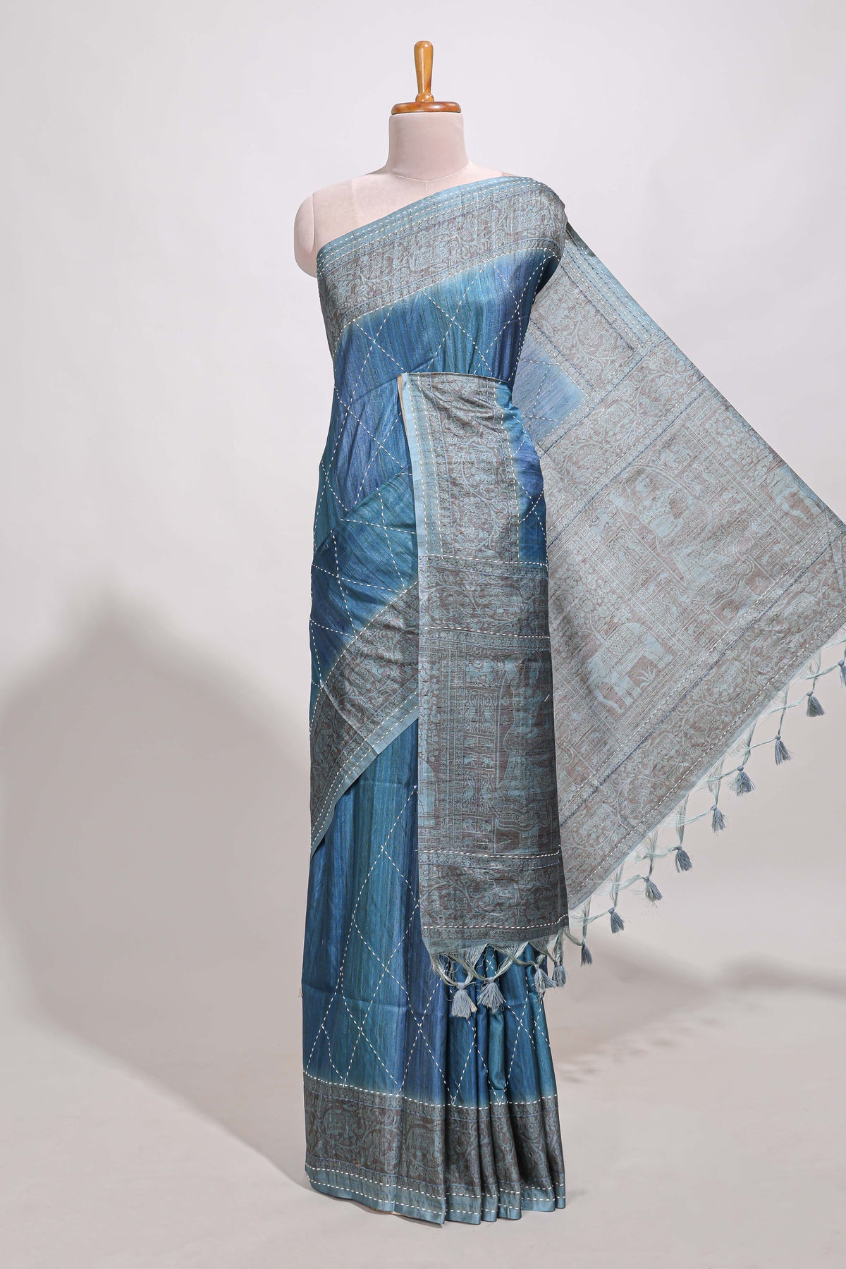 Ocean blue semi tussar saree all over thread work and intricate floral border and pallu with contrast blouse