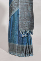 Ocean blue semi tussar saree all over thread work and intricate floral border and pallu with contrast blouse