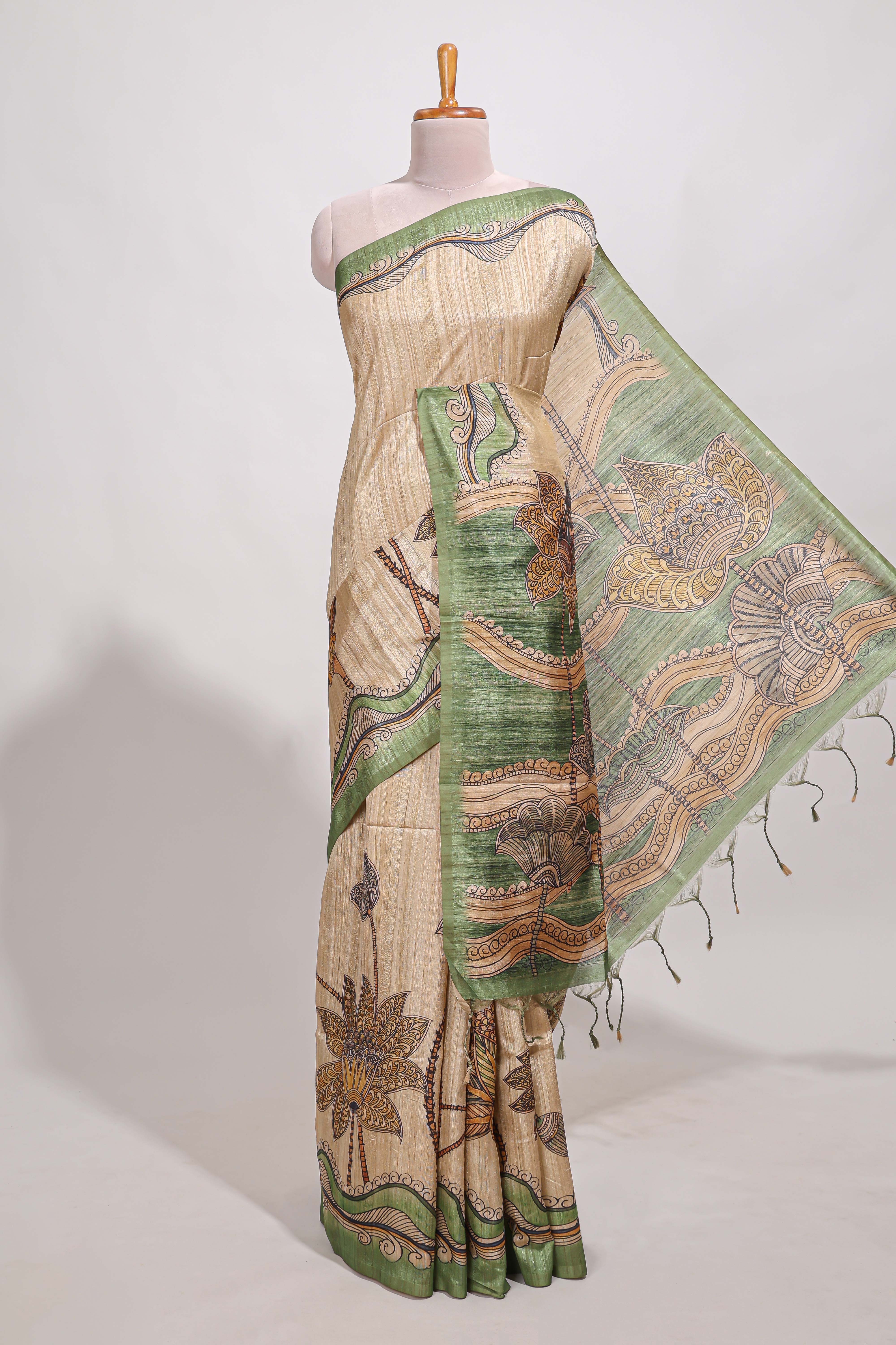 Beige colour semi tussar saree with contrast leafborder and nature art pallu with contrast blouse