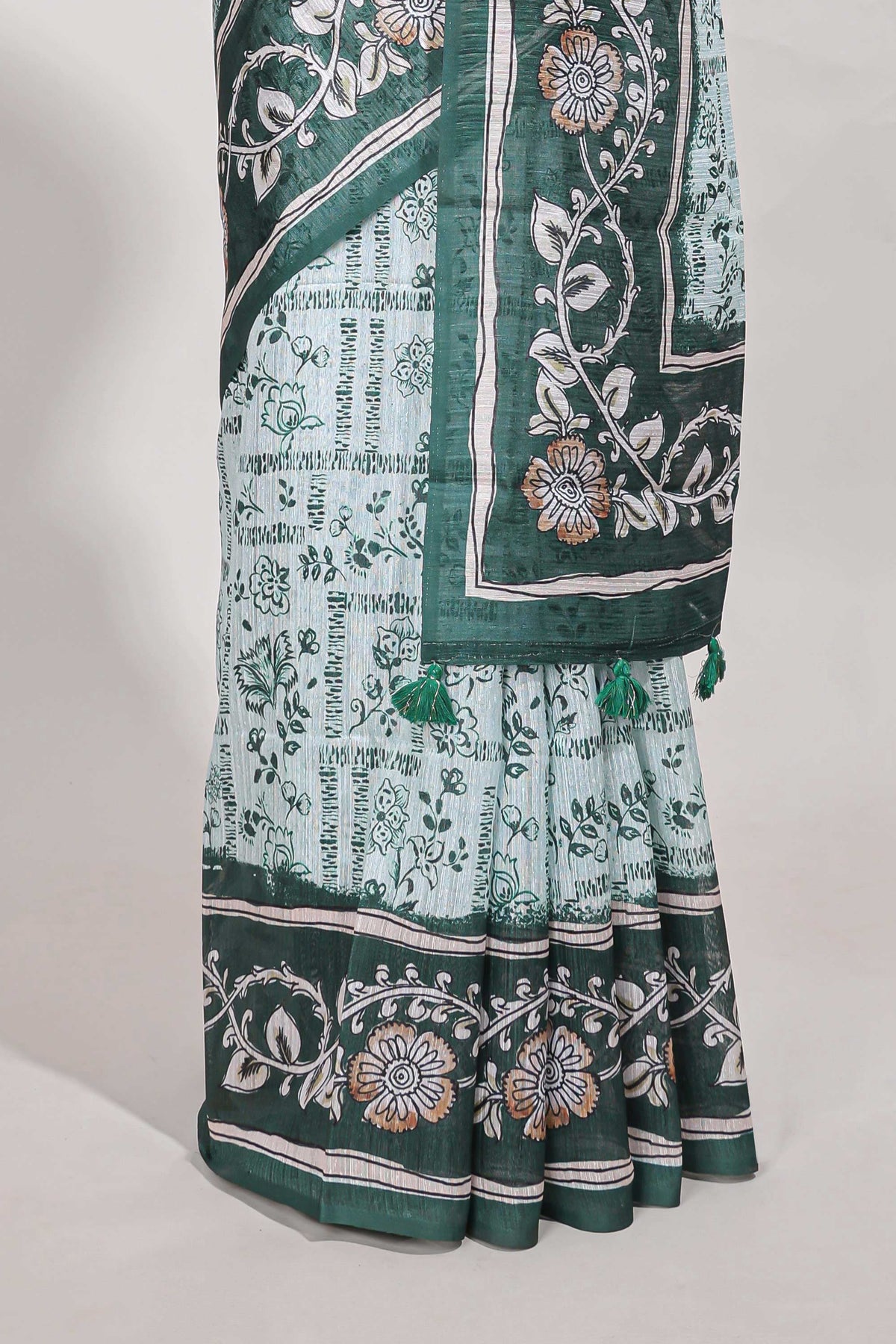 Green colour floral printed  semi tussar saree with creeper  border and matching printed blouse