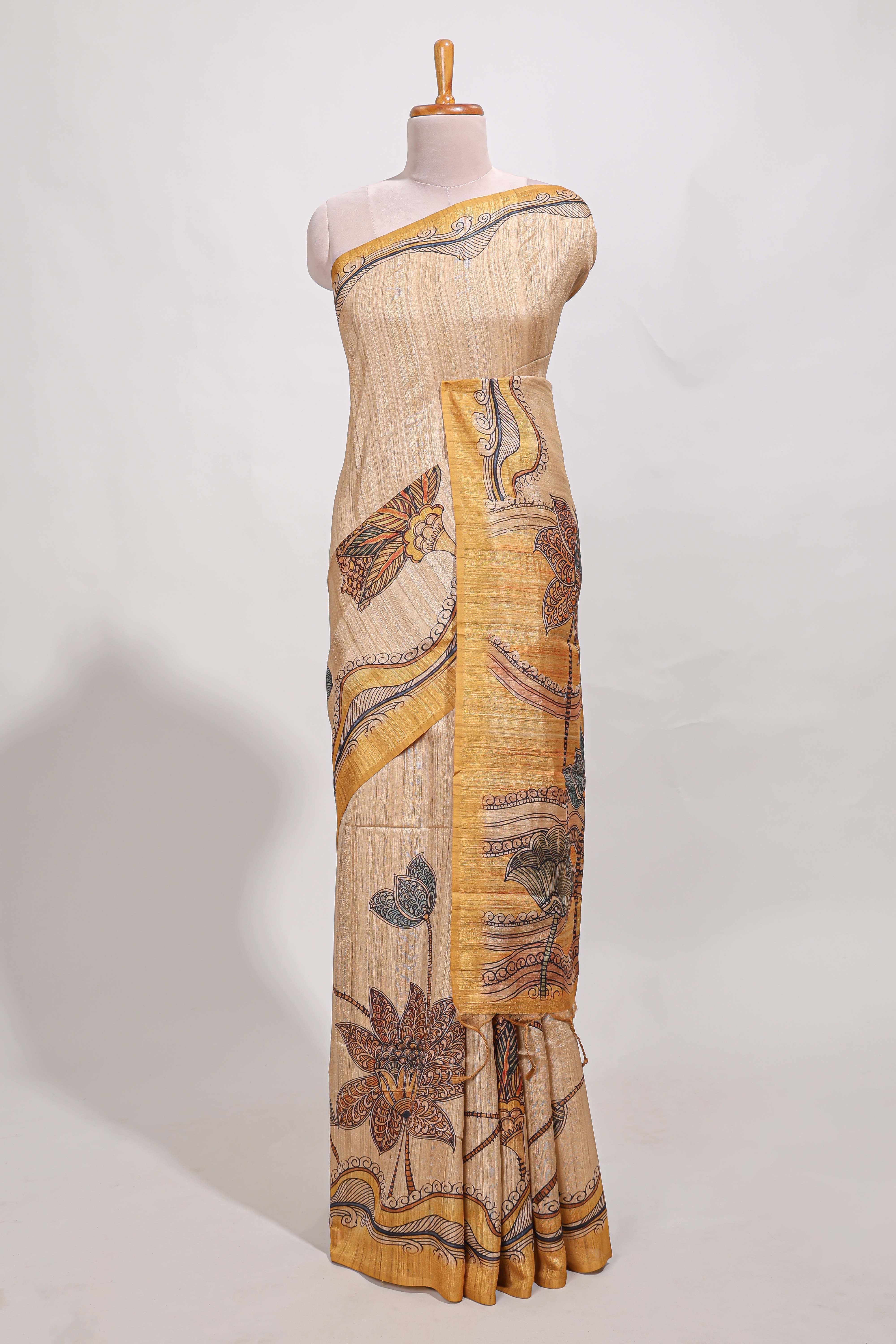 Cream colour semi tussar saree with contrast leafborder and nature art pallu with contrast blouse