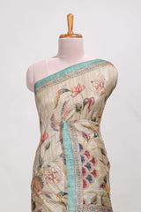 Cream colour semi tussar saree all over floral print with small contrast border and floral printed pallu with contrast blouse