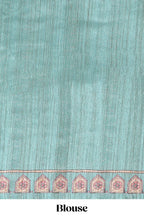 Cream colour semi tussar saree all over floral print with small contrast border and floral printed pallu with contrast blouse