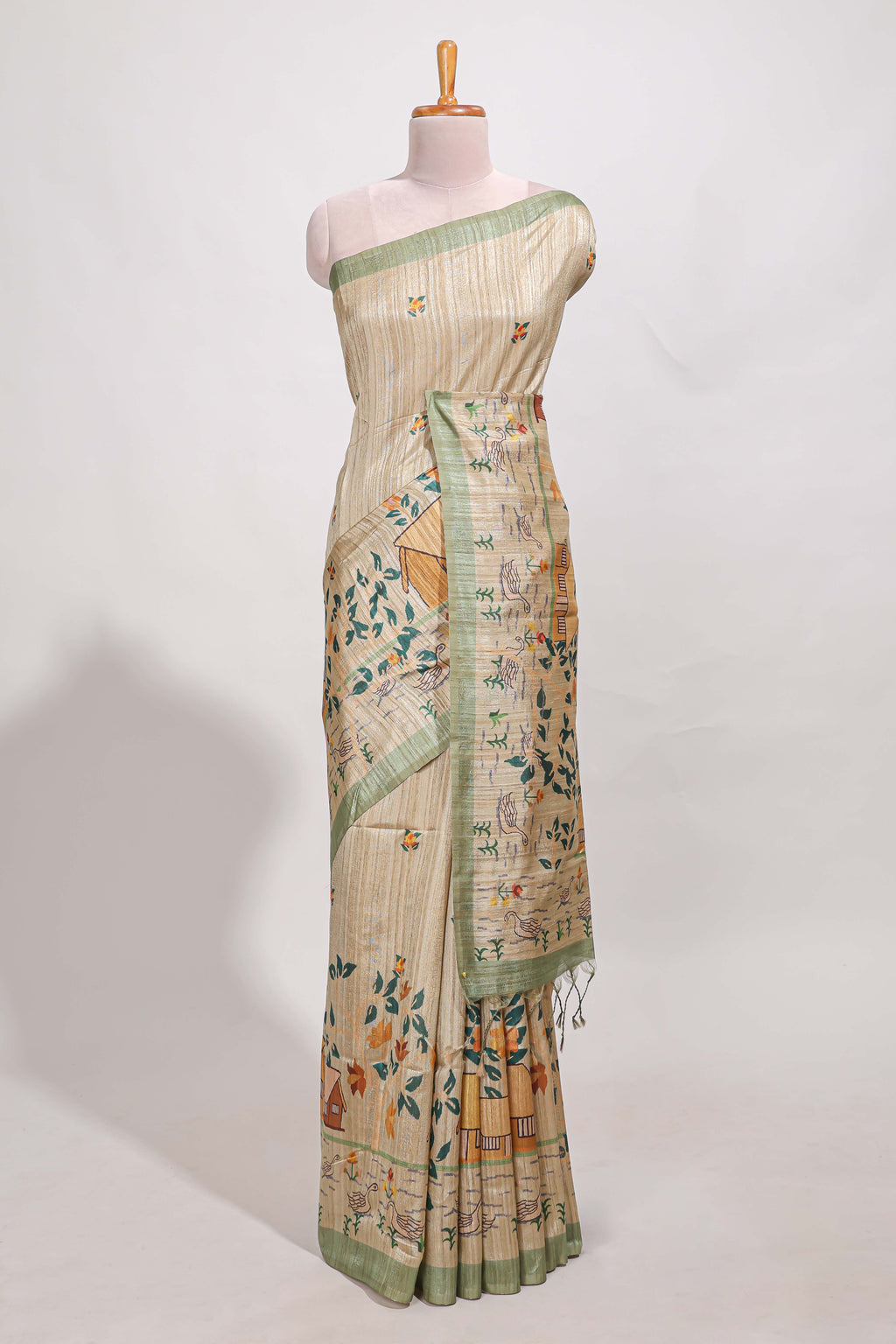 pastel green artistic village art tussar saree with small border and matching pallu