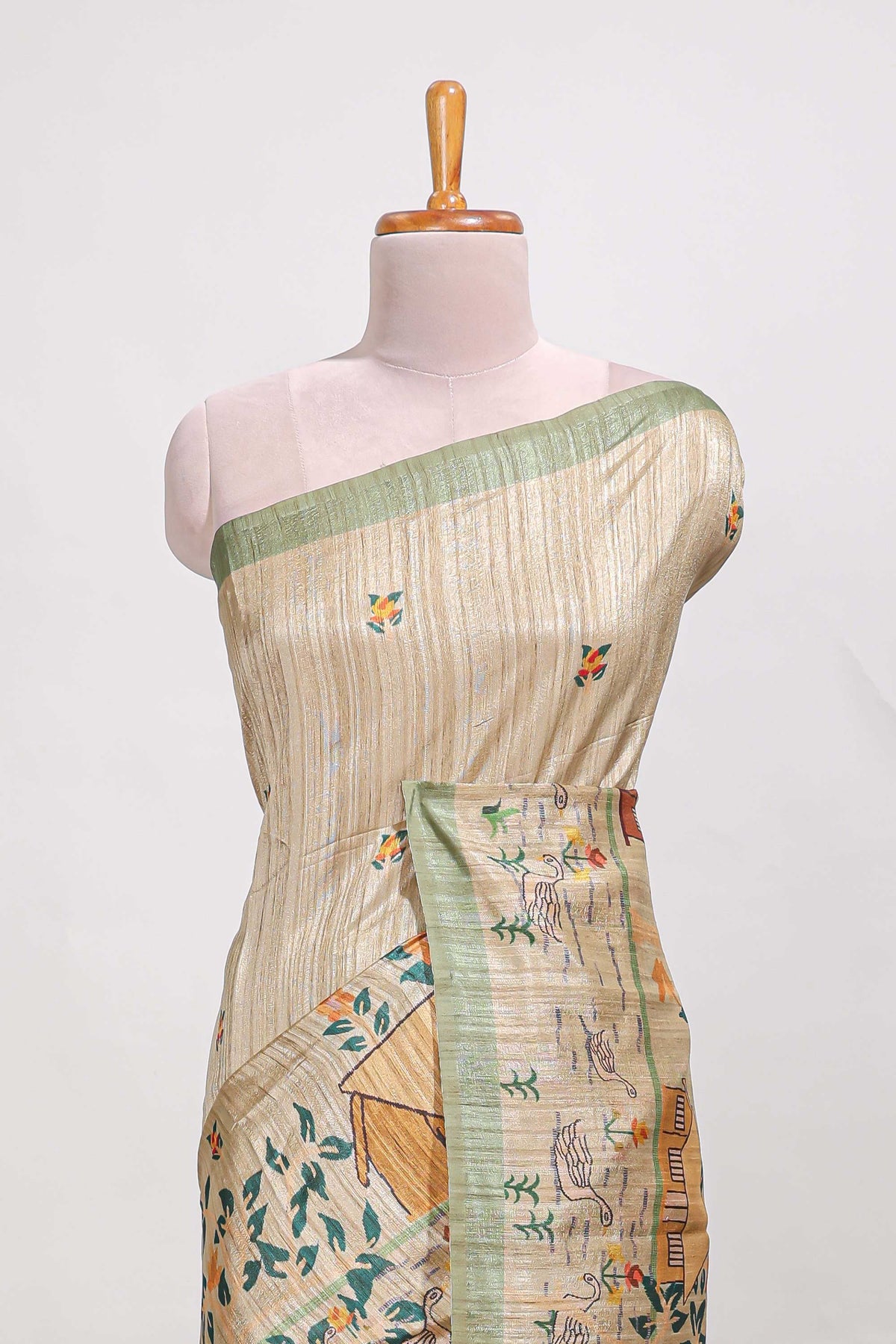 pastel green artistic village art tussar saree with small border and matching pallu
