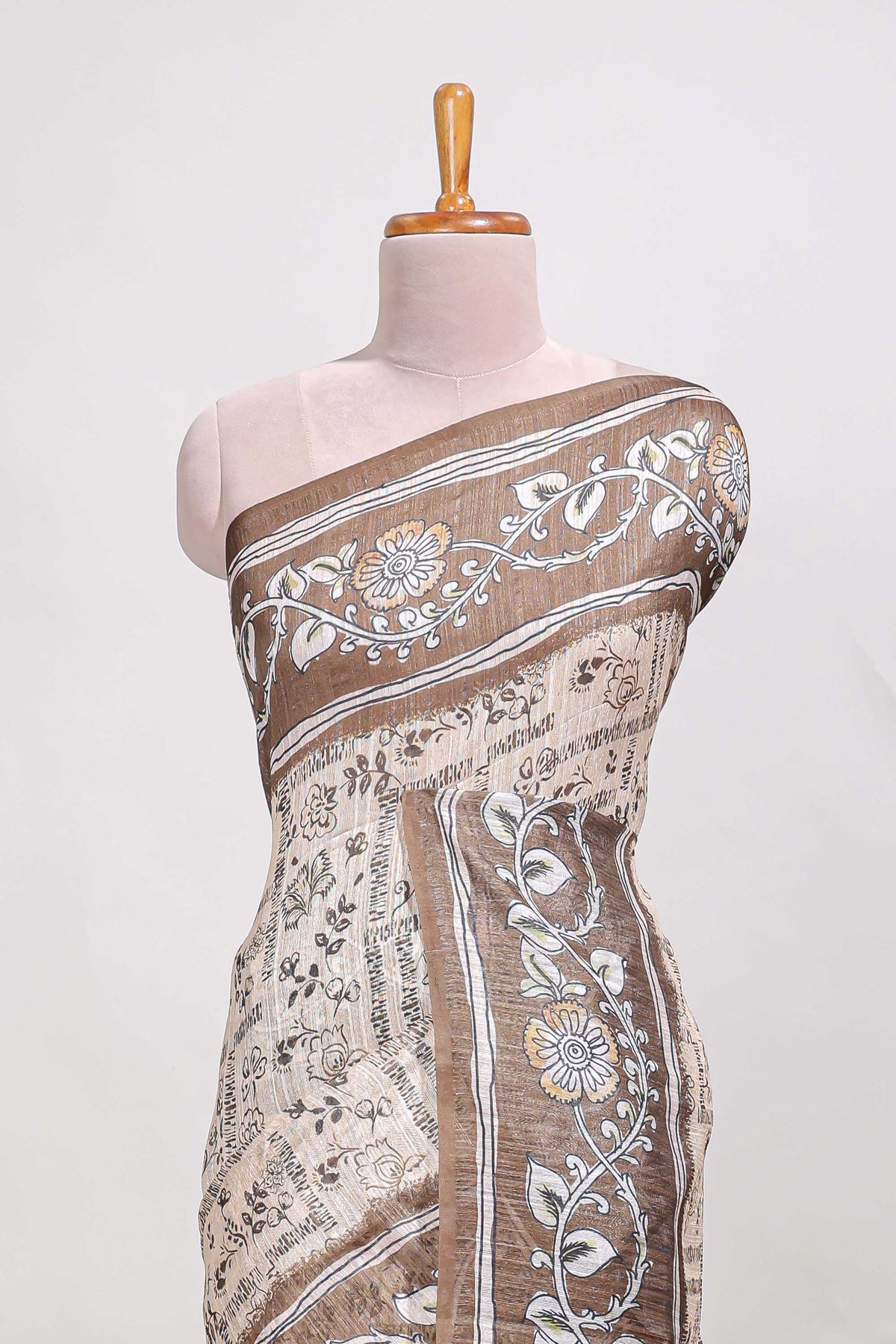 Brown colour floral printed  semi tussar saree with creeper  border and matching printed blouse