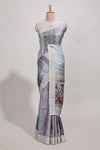 Grey kalamakri arttussar sareewith floral creeper prints zari border and dancing figures print pallu
