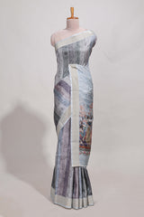 Grey kalamakri arttussar sareewith floral creeper prints zari border and dancing figures print pallu